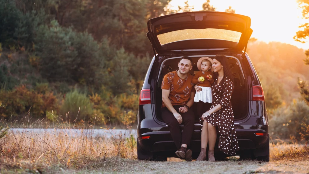 Shoot a picnic with a car in the background